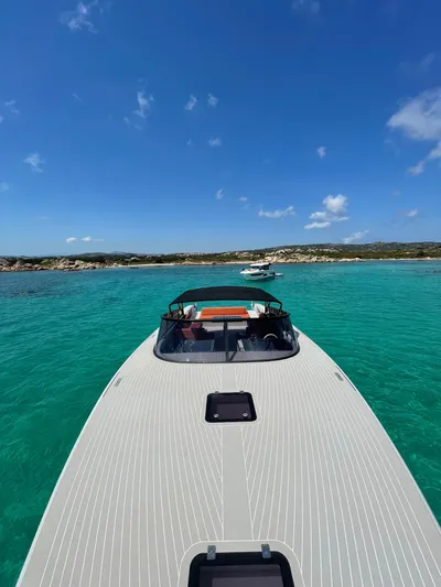  Yacht Photos Pics 2018 VanDutch 55 yacht on turquoise water under clear blue sky.