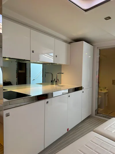  Yacht Photos Pics Luxurious 2018 VanDutch 55 yacht interior with sleek white cabinetry and modern design.