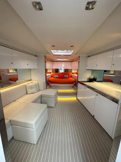  Yacht Photos Pics Luxurious interior of a 2018 VanDutch 55 yacht with modern furnishings and ambient lighting.