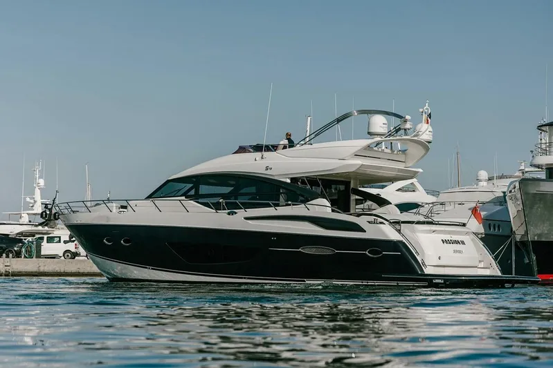  Yacht Photos Pics Luxury 2014 Princess S72 yacht docked in marina, side view.