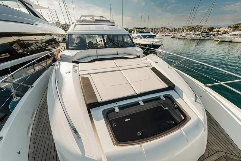  Yacht Photos Pics Luxury 2014 Princess S72 yacht docked in marina, showcasing sleek design and spacious deck.