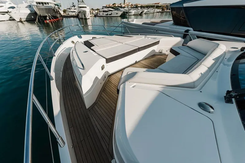  Yacht Photos Pics Luxurious 2014 Princess S72 yacht with spacious deck and seating area in marina.
