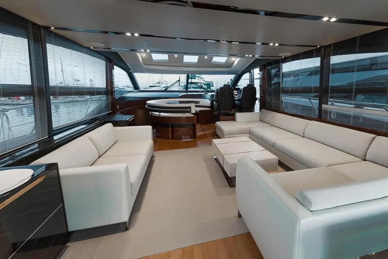  Yacht Photos Pics Luxurious interior of 2014 Princess S72 yacht with modern white seating and sleek design.