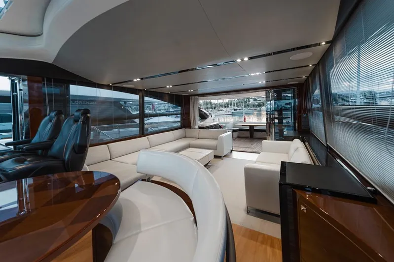  Yacht Photos Pics Luxurious interior of 2014 Princess S72 yacht with modern seating and panoramic windows.