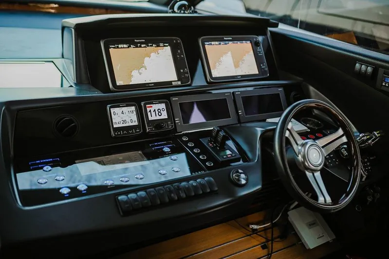  Yacht Photos Pics Cockpit of 2014 Princess S72 yacht with advanced navigation and control systems.
