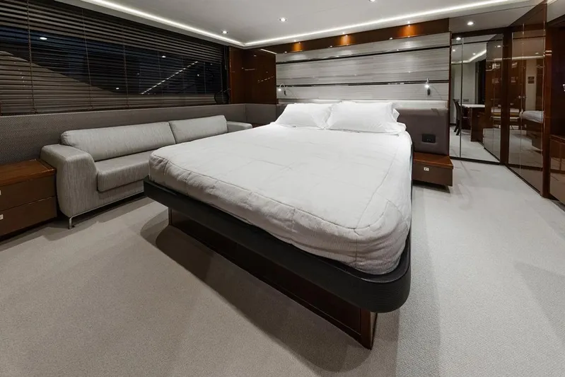  Yacht Photos Pics Luxurious bedroom interior of 2014 Princess S72 yacht with modern design and elegant furnishings.
