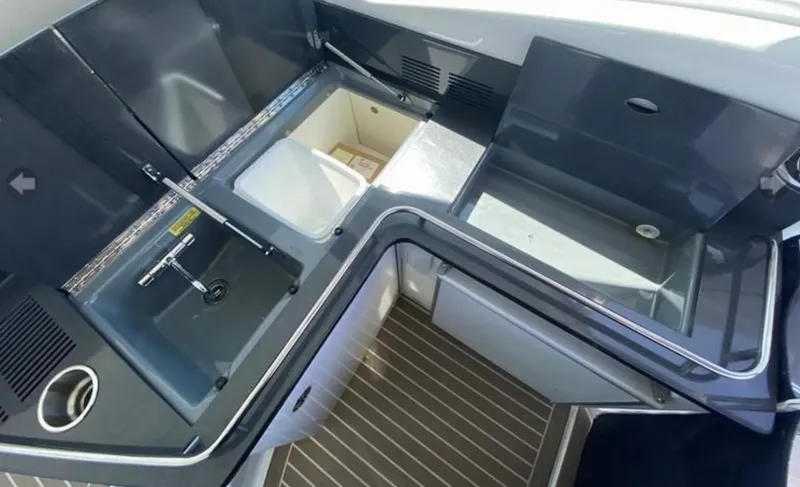 Our Seabatical Yacht Photos Pics 2014 Formula 45 Yacht interior with sleek kitchen sink and storage compartments.