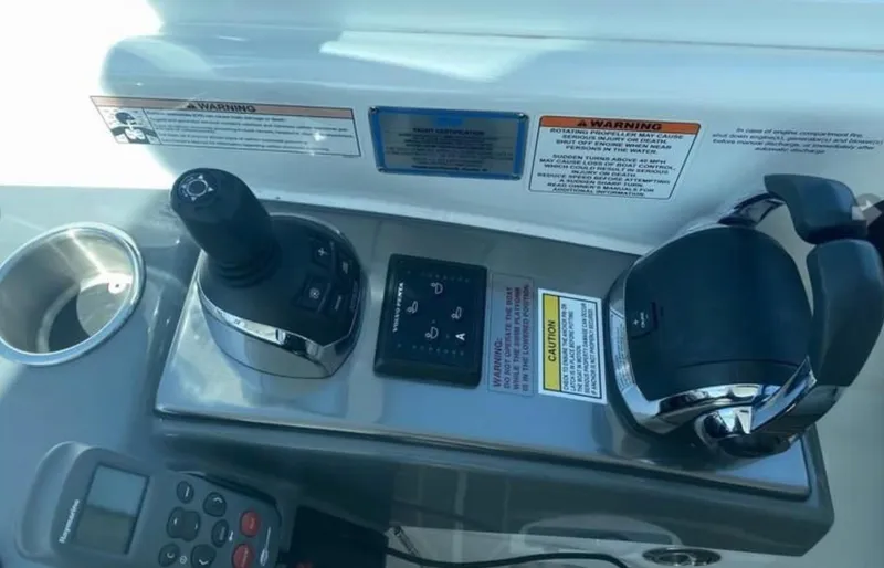 Our Seabatical Yacht Photos Pics Control panel of a 2014 Formula 45 Yacht with joystick and throttle.
