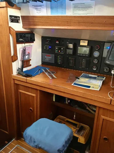  Yacht Photos Pics Navigation station of 1990 Van De Stadt 44 Deck Saloon yacht with communication equipment.