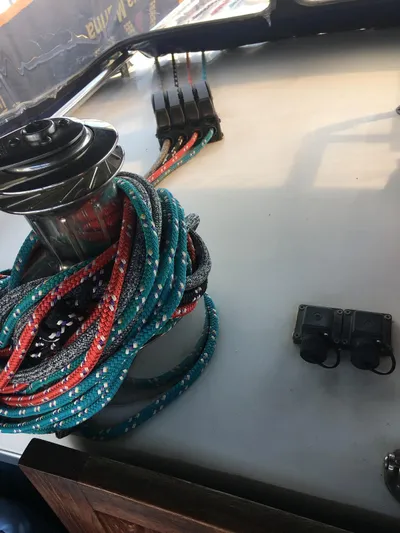  Yacht Photos Pics Deck of 1990 Van De Stadt 44 Deck Saloon with winch and colorful ropes.