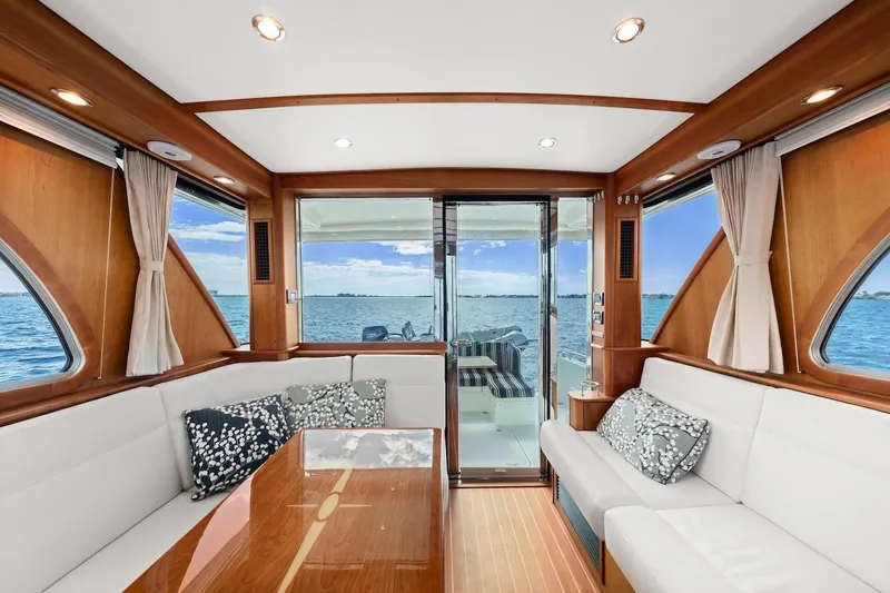 Balahula Yacht Photos Pics Luxurious interior of 2019 Sabre 45 Salon Express yacht with ocean view.