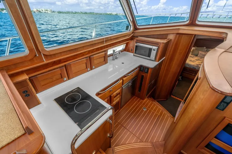 Balahula Yacht Photos Pics 2019 Sabre 45 Salon Express yacht interior with modern galley and ocean view.