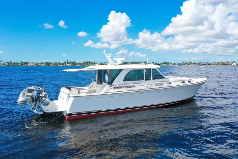Balahula Yacht Photos Pics 2019 Sabre 45 Salon Express yacht cruising on a sunny day, blue sky and water.