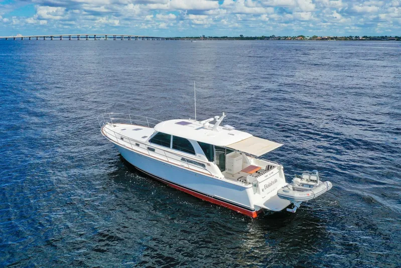 Balahula Yacht Photos Pics 2019 Sabre 45 Salon Express yacht cruising on open water under a cloudy sky.