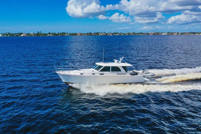 Balahula Yacht Photos Pics 2019 Sabre 45 Salon Express cruising on open water under a partly cloudy sky.