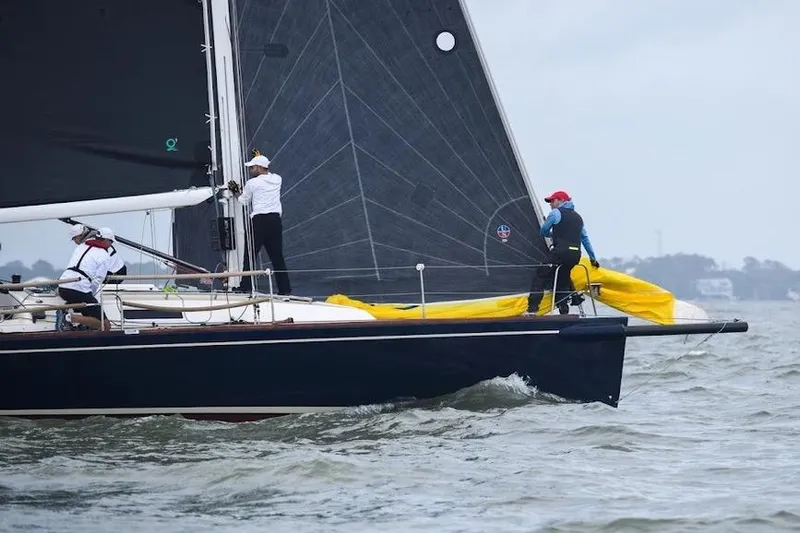 Microdarcy(ud) Yacht Photos Pics Sailors maneuvering a 2005 J Boats J/124 yacht on choppy waters.