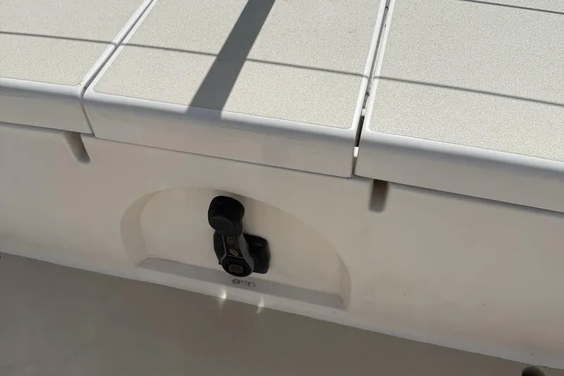 Microdarcy(ud) Yacht Photos Pics 2005 J Boats J/124 deck detail with latch and textured surface.