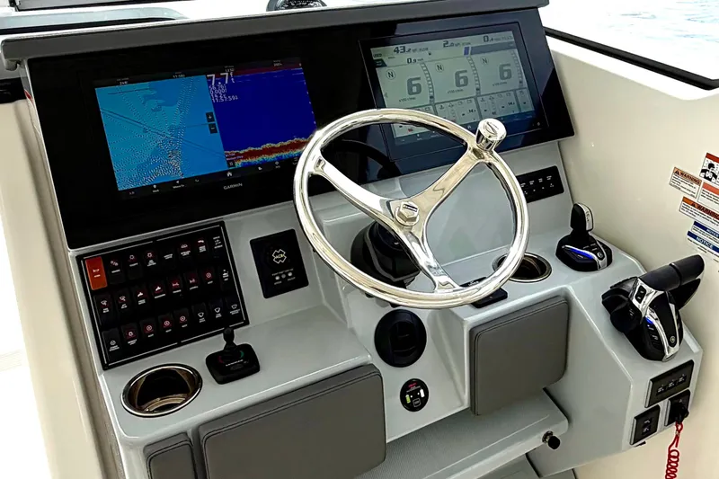  Yacht Photos Pics 2024 Pursuit DC 365 Dual Console helm with advanced navigation displays and controls.