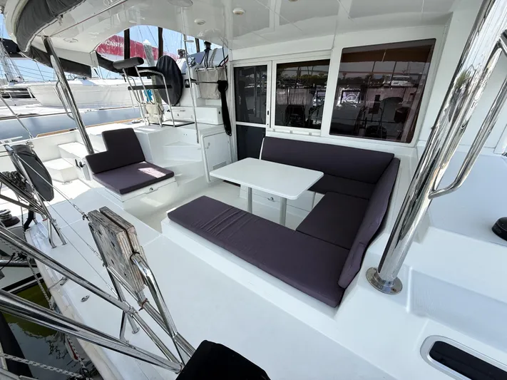 Escapist Yacht Photos Pics Spacious seating area on 2018 Lagoon 400 S2 catamaran with modern design.