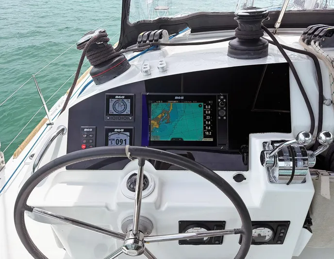 Escapist Yacht Photos Pics 2018 Lagoon 400 S2 yacht helm with navigation equipment and steering wheel.