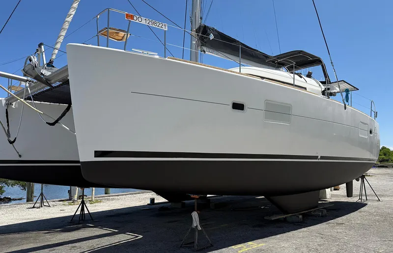 Escapist Yacht Photos Pics 2018 Lagoon 400 S2 catamaran on dry dock, side view.