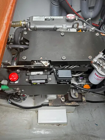 Escapist Yacht Photos Pics Engine compartment of a 2018 Lagoon 400 S2 catamaran, featuring a Yanmar engine.