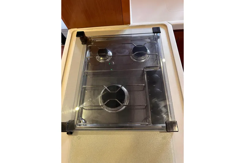 Dove Yacht Photos Pics Stove on 2015 Beneteau Swift Trawler 50 yacht, featuring a protective cover.