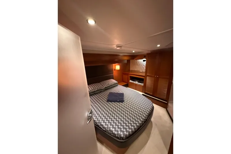 Dove Yacht Photos Pics Luxurious bedroom interior of 2015 Beneteau Swift Trawler 50 yacht.