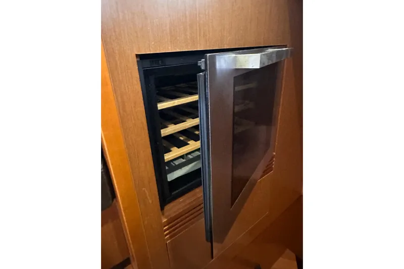 Dove Yacht Photos Pics Wine cooler with open door on 2015 Beneteau Swift Trawler 50 yacht.