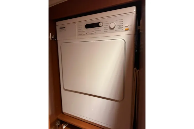 Dove Yacht Photos Pics Miele dryer inside 2015 Beneteau Swift Trawler 50 yacht cabinet.