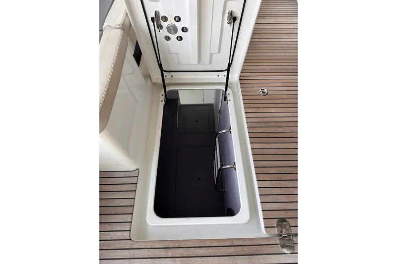 Dove Yacht Photos Pics Hatch opening on 2015 Beneteau Swift Trawler 50 with teak deck flooring.