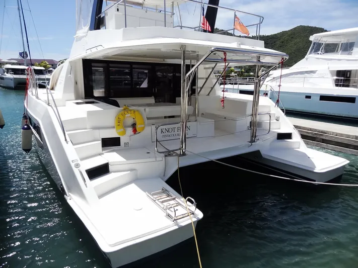 Livitup Yacht Photos Pics 2017 Leopard 43 Powercat yacht docked at marina, rear view.