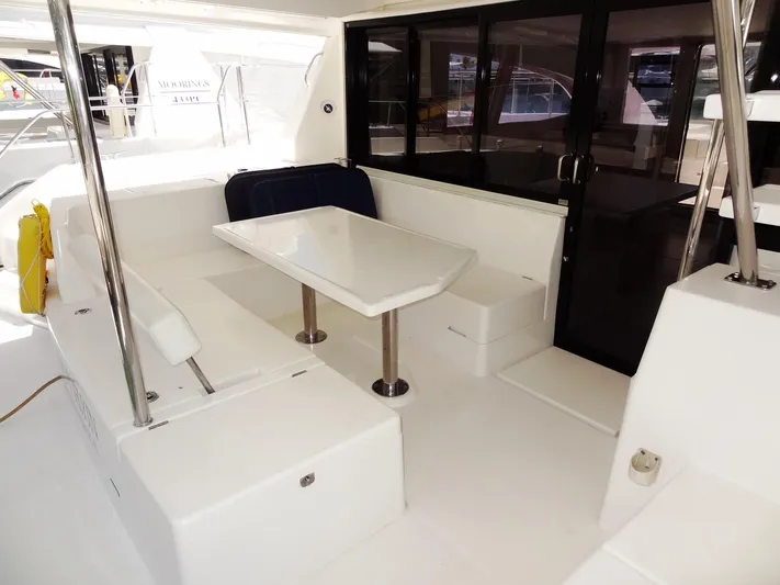 Livitup Yacht Photos Pics 2017 Leopard 43 Powercat yacht interior with seating and table.