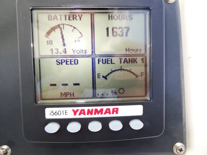 Knot Flyin Yacht Photos Pics Yanmar engine display on a 2017 Leopard 43 Powercat showing battery, hours, speed, and fuel tank levels.