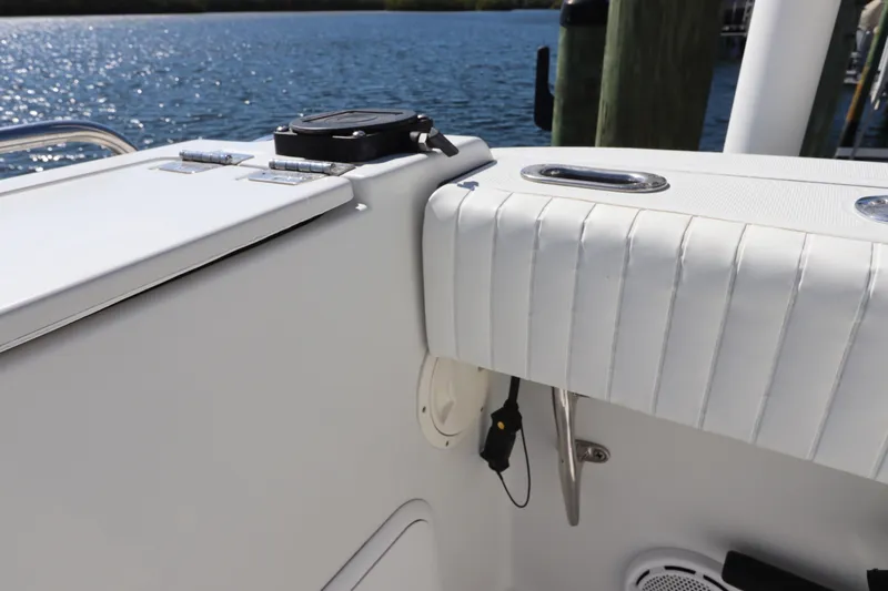 Yacht Photos Pics 2008 Glacier Bay 3080 Coastal Runner boat interior with white seating and water view.