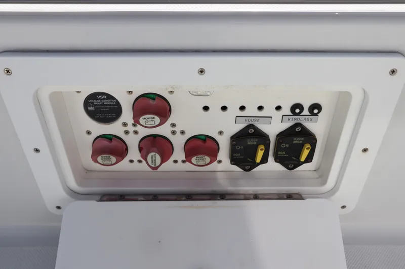  Yacht Photos Pics Control panel of 2008 Glacier Bay 3080 Coastal Runner boat with switches and labels.