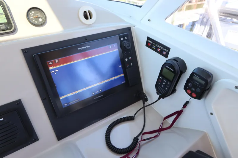  Yacht Photos Pics Control panel of 2008 Glacier Bay 3080 Coastal Runner with navigation equipment.