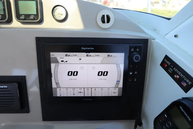  Yacht Photos Pics Dashboard of 2008 Glacier Bay 3080 Coastal Runner with Raymarine display and controls.
