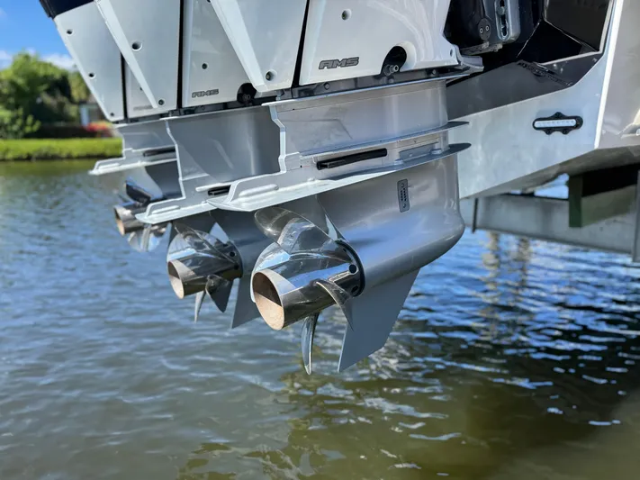 Uncorked Yacht Photos Pics 2023 Formula 350 Crossover Bowrider outboard engines on water.