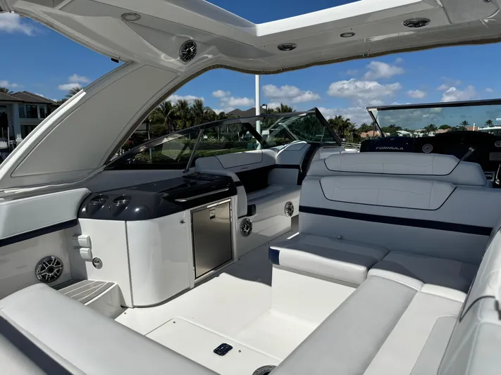 Uncorked Yacht Photos Pics 2023 Formula 350 Crossover Bowrider interior with luxurious seating and modern amenities.