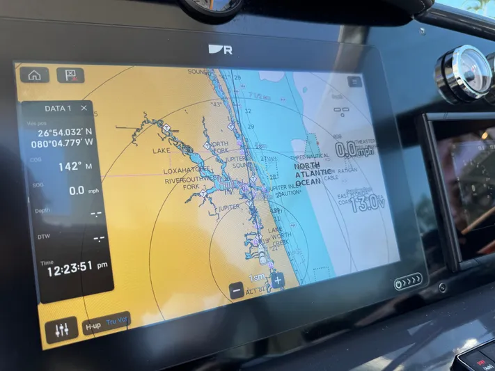 Uncorked Yacht Photos Pics Navigation display on 2023 Formula 350 Crossover Bowrider, showing coastal map and coordinates.