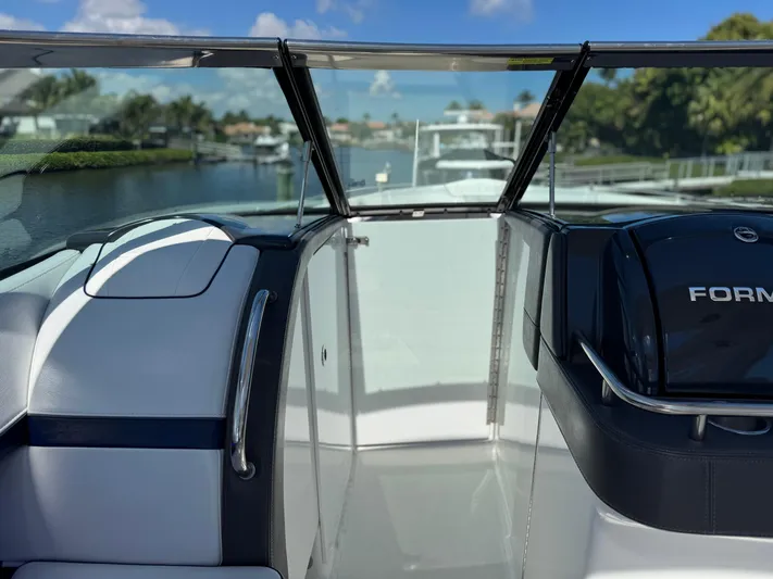 Uncorked Yacht Photos Pics 2023 Formula 350 Crossover Bowrider interior with sleek design and waterfront view.