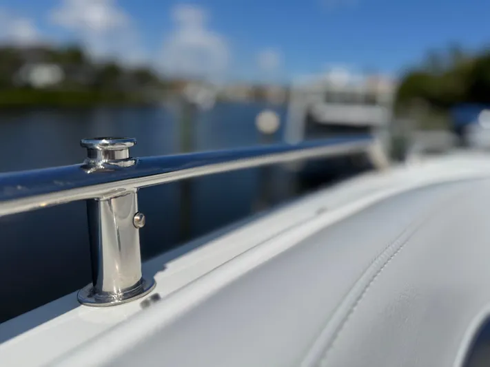 Uncorked Yacht Photos Pics 2023 Formula 350 Crossover Bowrider, stainless steel railing, sunny waterfront view.