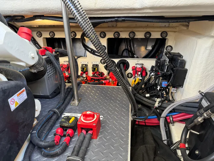 Uncorked Yacht Photos Pics Engine compartment of 2023 Formula 350 Crossover Bowrider with wiring and components.