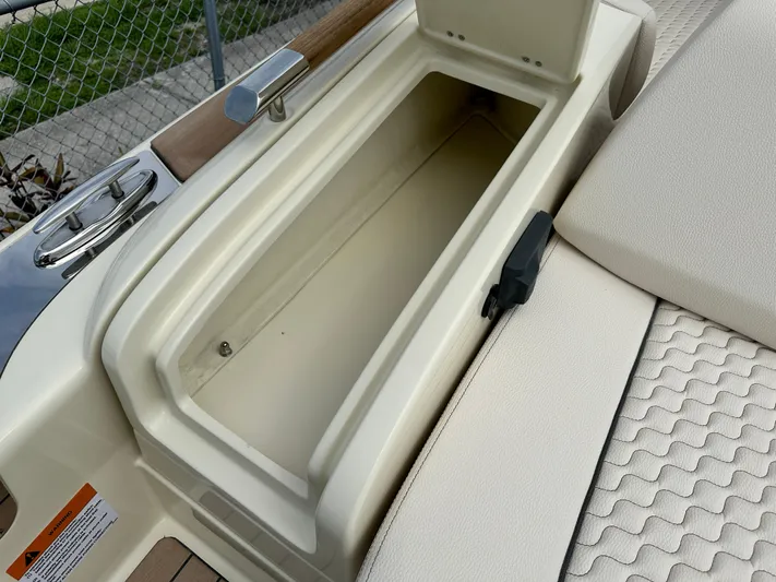  Yacht Photos Pics 2025 Chris-Craft Launch 31 GT storage compartment with open lid.
