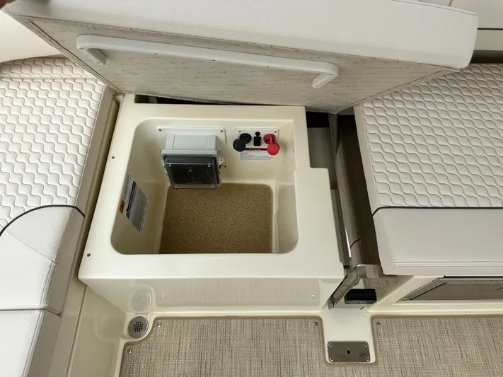 Yacht Photos Pics 2025 Chris-Craft Launch 31 GT storage compartment with electrical components.