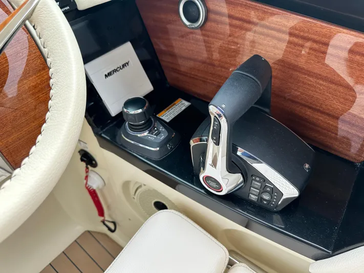  Yacht Photos Pics Control panel of 2025 Chris-Craft Launch 31 GT boat with Mercury throttle and joystick.