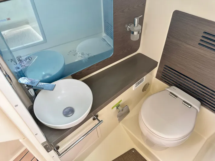  Yacht Photos Pics 2025 Chris-Craft Launch 31 GT boat bathroom with modern sink and toilet.