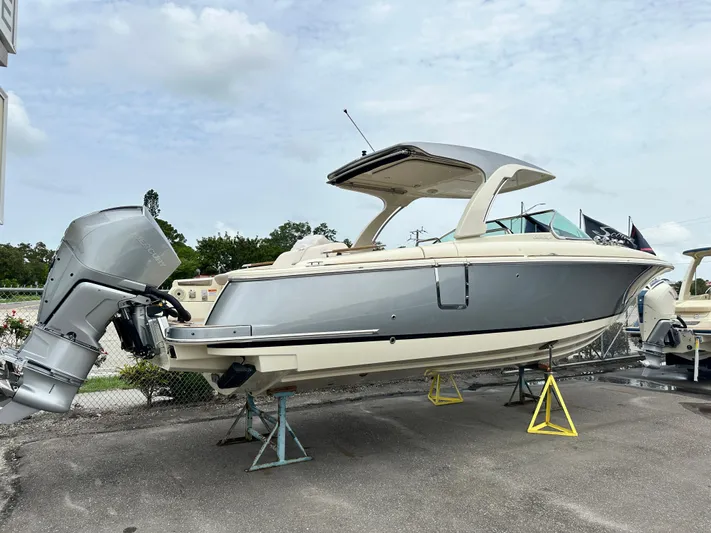  Yacht Photos Pics 2025 Chris-Craft Launch 31 GT boat on stands, side view.