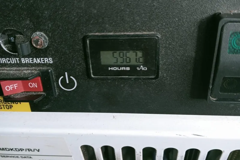 Amura Yacht Photos Pics Control panel with circuit breakers and hour meter reading 5967 hours, Bali 5.4 Open Space 2021.